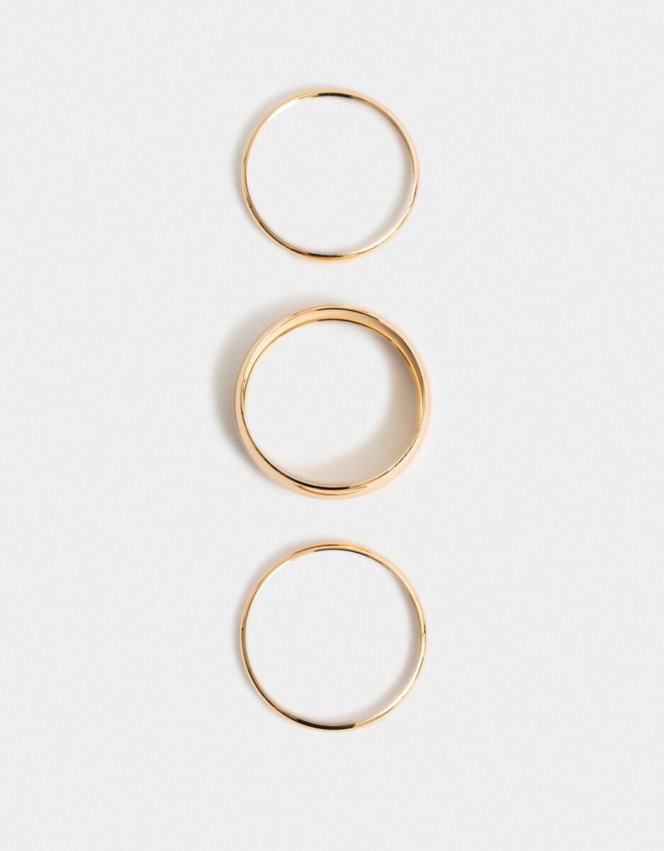 Set De Pulseras Rígidas Doradas 