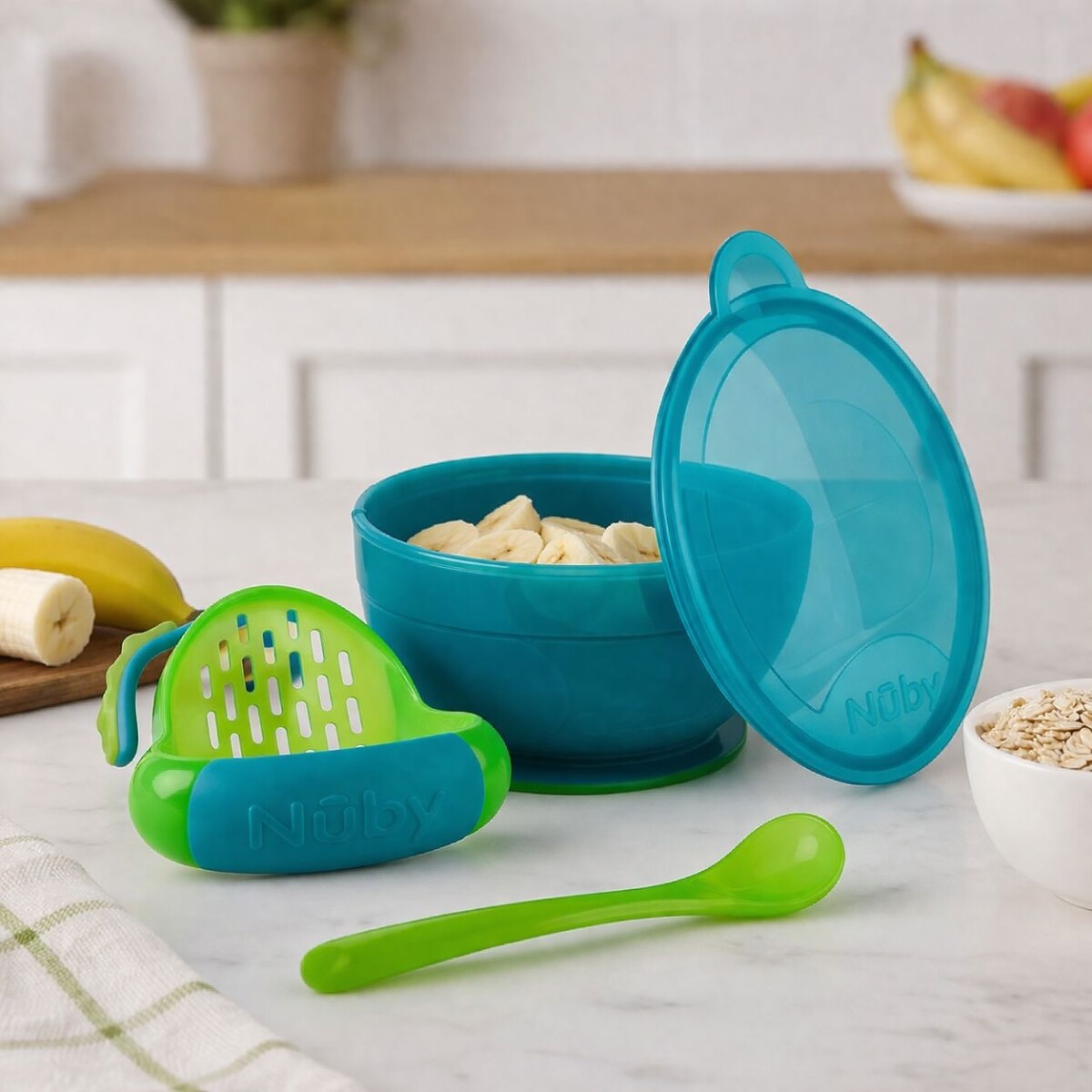Set Preparador de Papillas Nuby con Pisador, Cuchara y Bowl Antideslizante - Celeste 