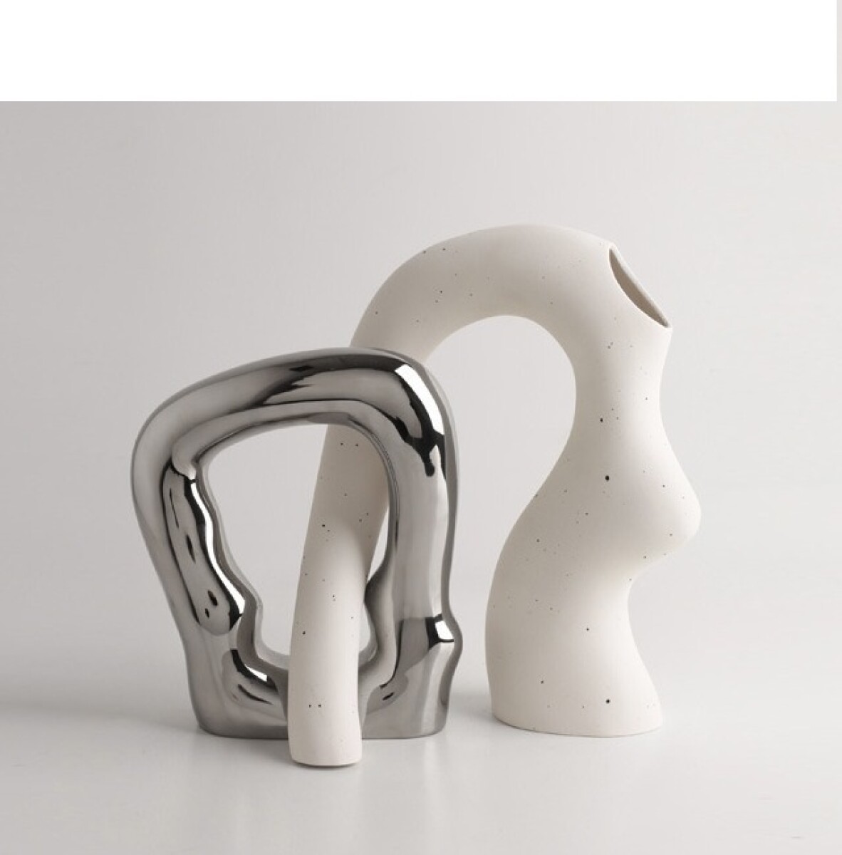 DUO DE CERAMICA PLATEADO Y BLANCO 