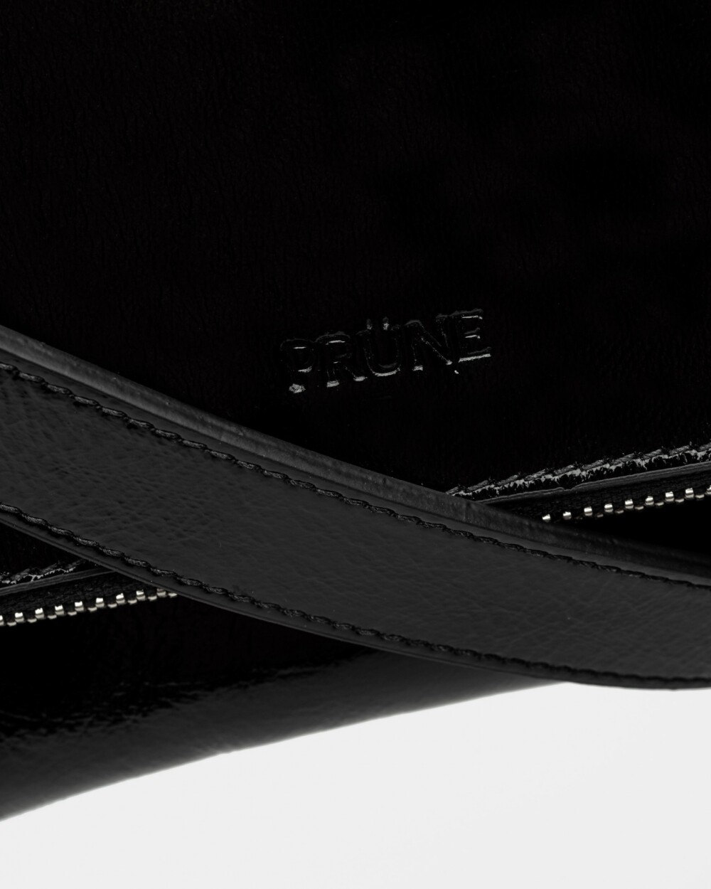 Bandolera Curve en charol Negro