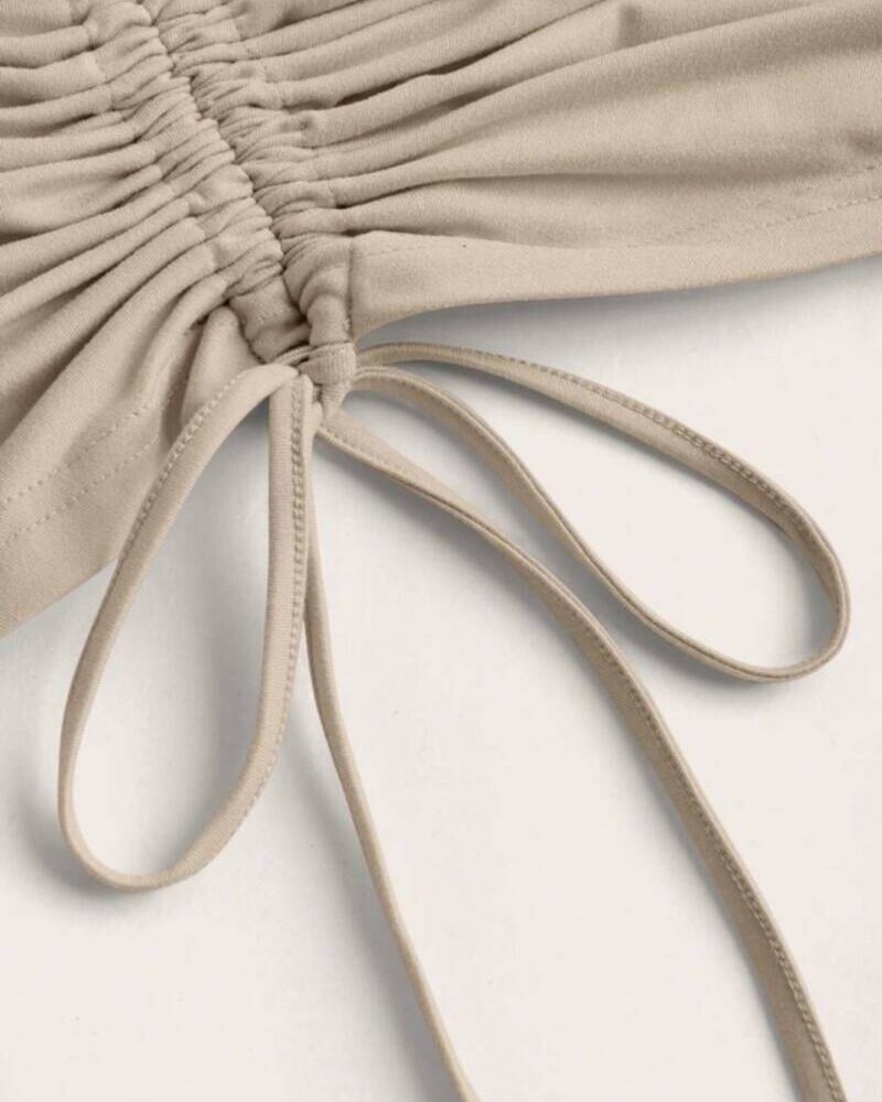 CONJUNTO TOP ASIMETRICO Y FALDA BEIGE Beige
