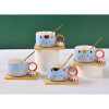TAZA DE CERAMICA C/ CUCHARA Y BASE DE MADERA TAZA DE CERAMICA C/ CUCHARA Y BASE DE MADERA