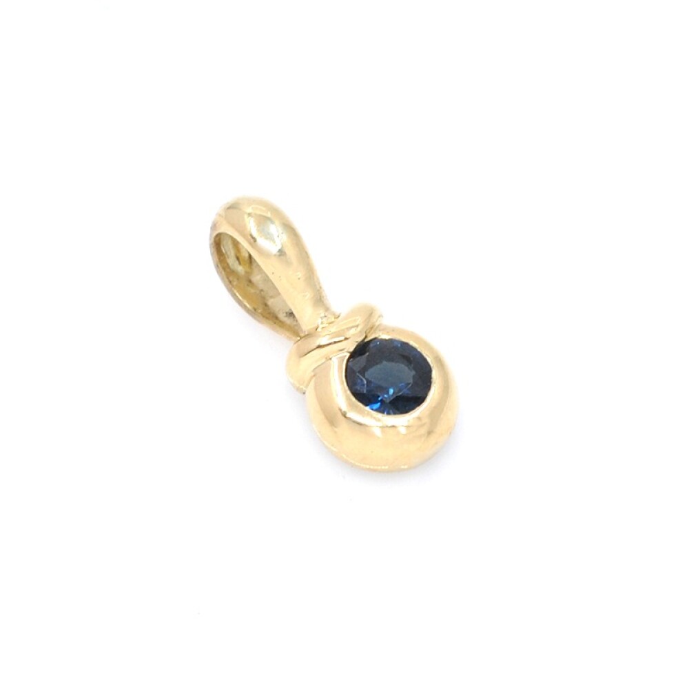 Colgante en oro 18k con zafiro azul Colgante en oro 18k con zafiro azul