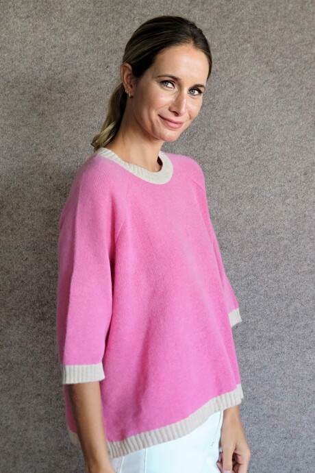 Buzo Clemen Rosa chicle Arena