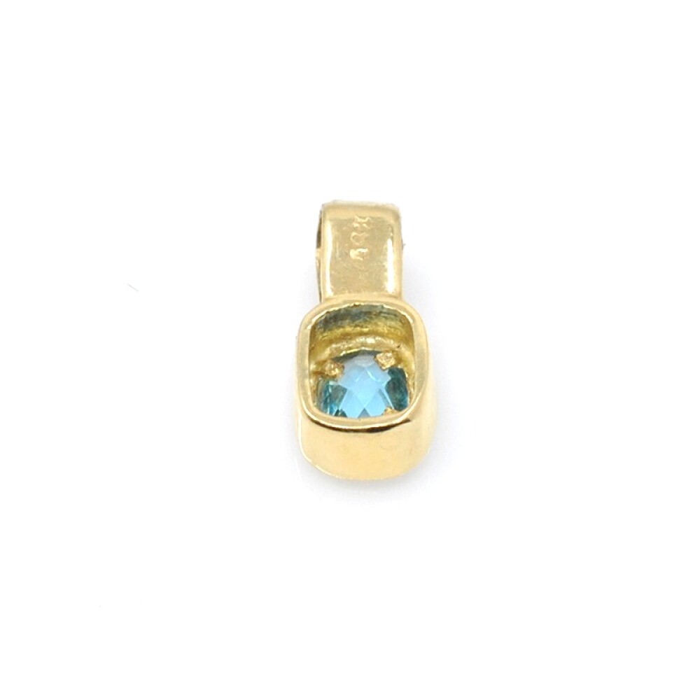 Colgante en oro 18k y topacio Colgante en oro 18k y topacio