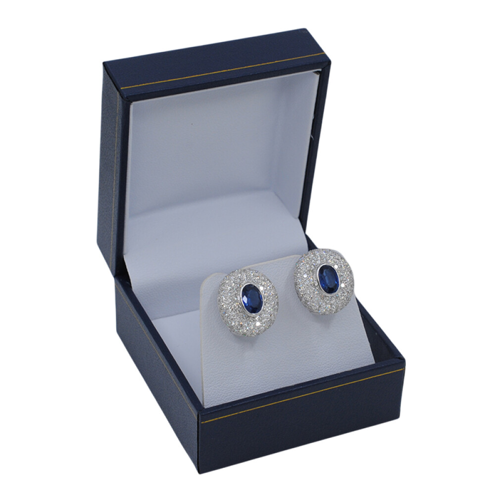 Caravanas en oro 18k blanco, brillantes y zafiro oval Caravanas en oro 18k blanco, brillantes y zafiro oval