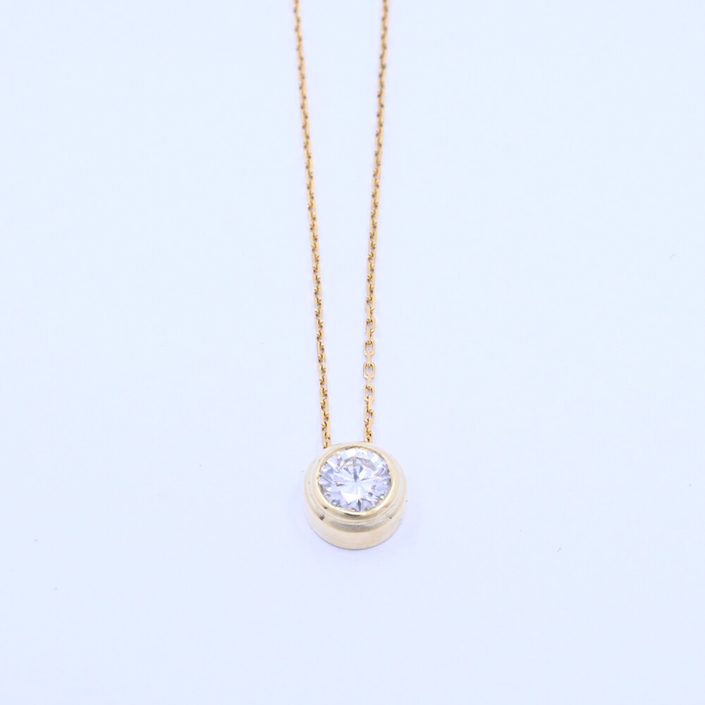 Dije oro 18k y brillante doble virola. Dije oro 18k y brillante doble virola.