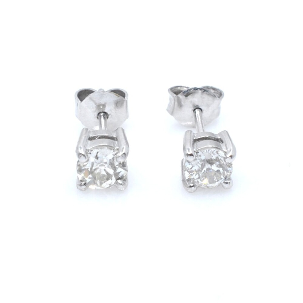 Caravanas en oro 18k blanco y brillantes. Caravanas en oro 18k blanco y brillantes.