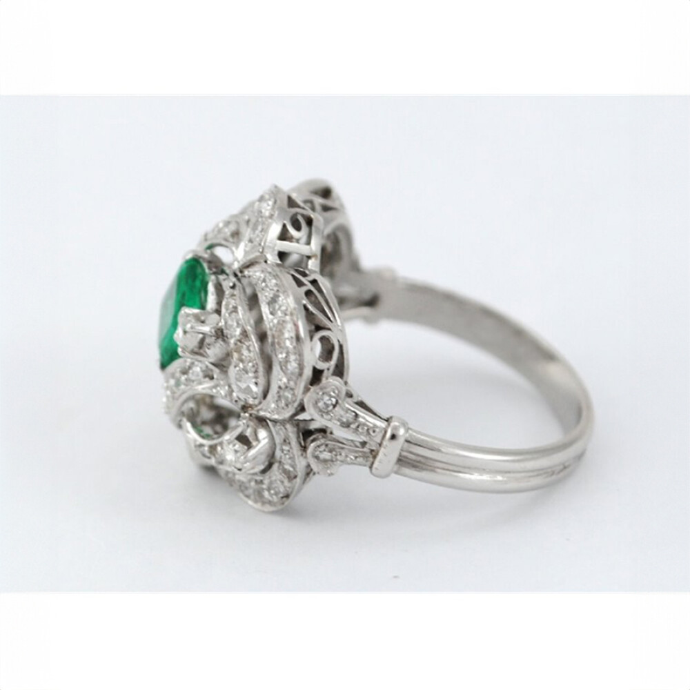 Anillo latino brillantes y esmeralda Anillo latino brillantes y esmeralda