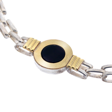Pulsera de plata 925, double en oro 18 ktes y onix. Pulsera de plata 925, double en oro 18 ktes y onix.