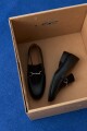 Mocasín hebilla metálica negro