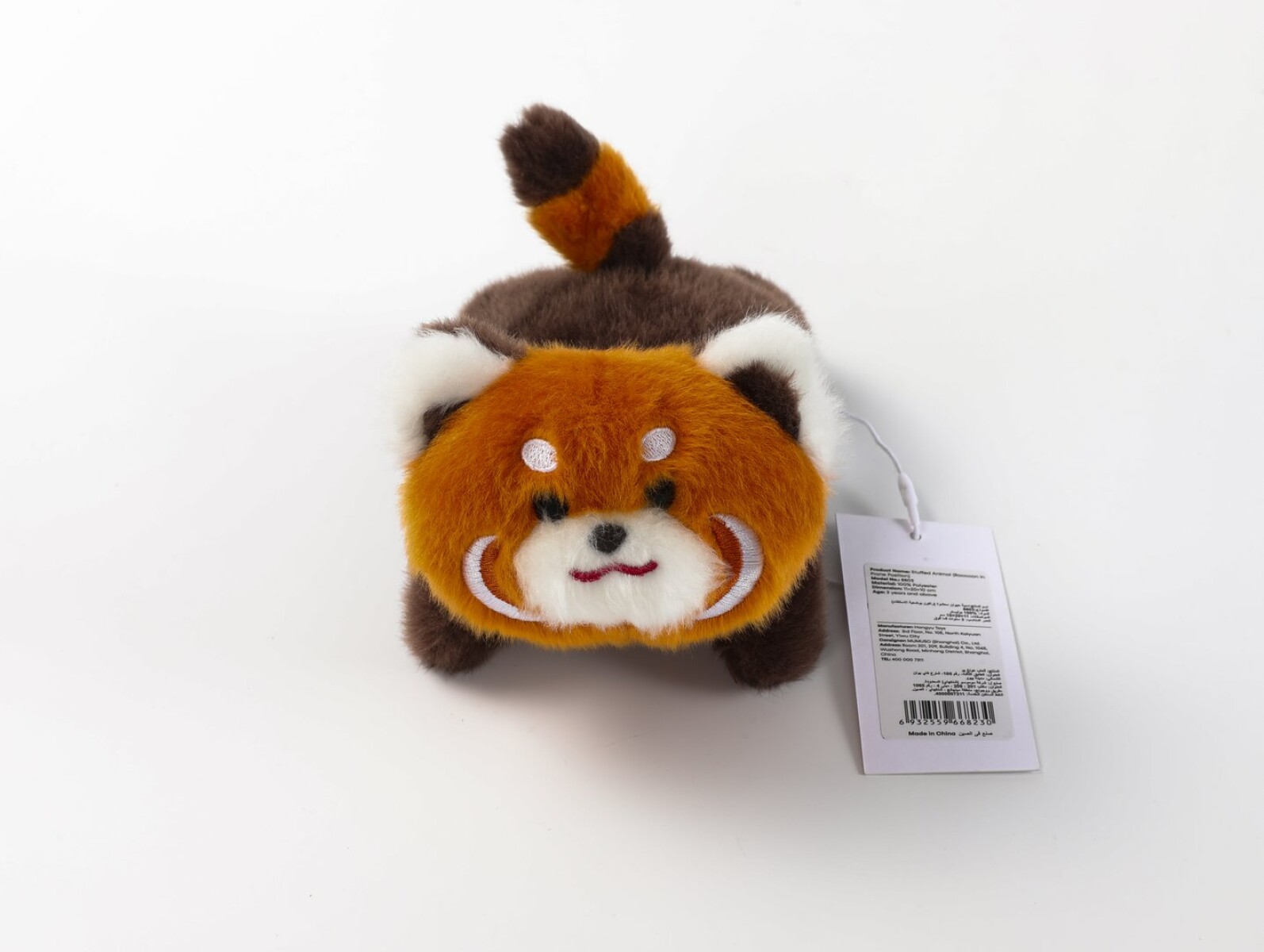 PELUCHE MAPACHE ACOSTADO 
