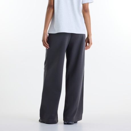 Pantalón New Balance de Dama - Trackside - WB62412FBLK DARK GREY