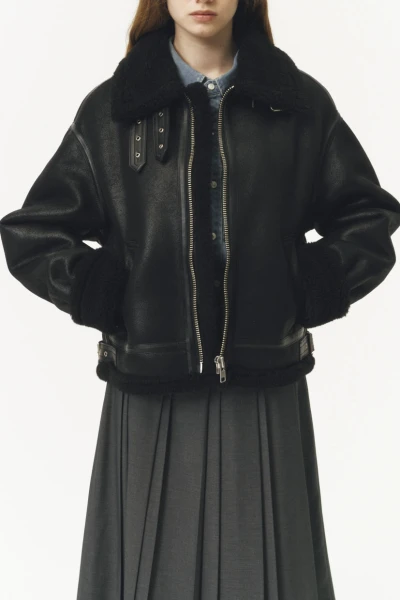 CHAQUETA Negro