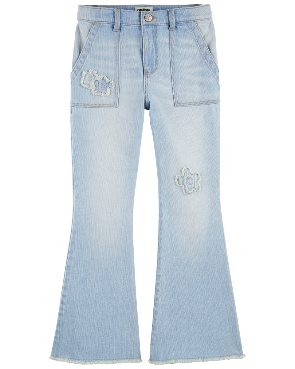 Pantalón jean acampanado, con parches florales. Talles 6-14 
