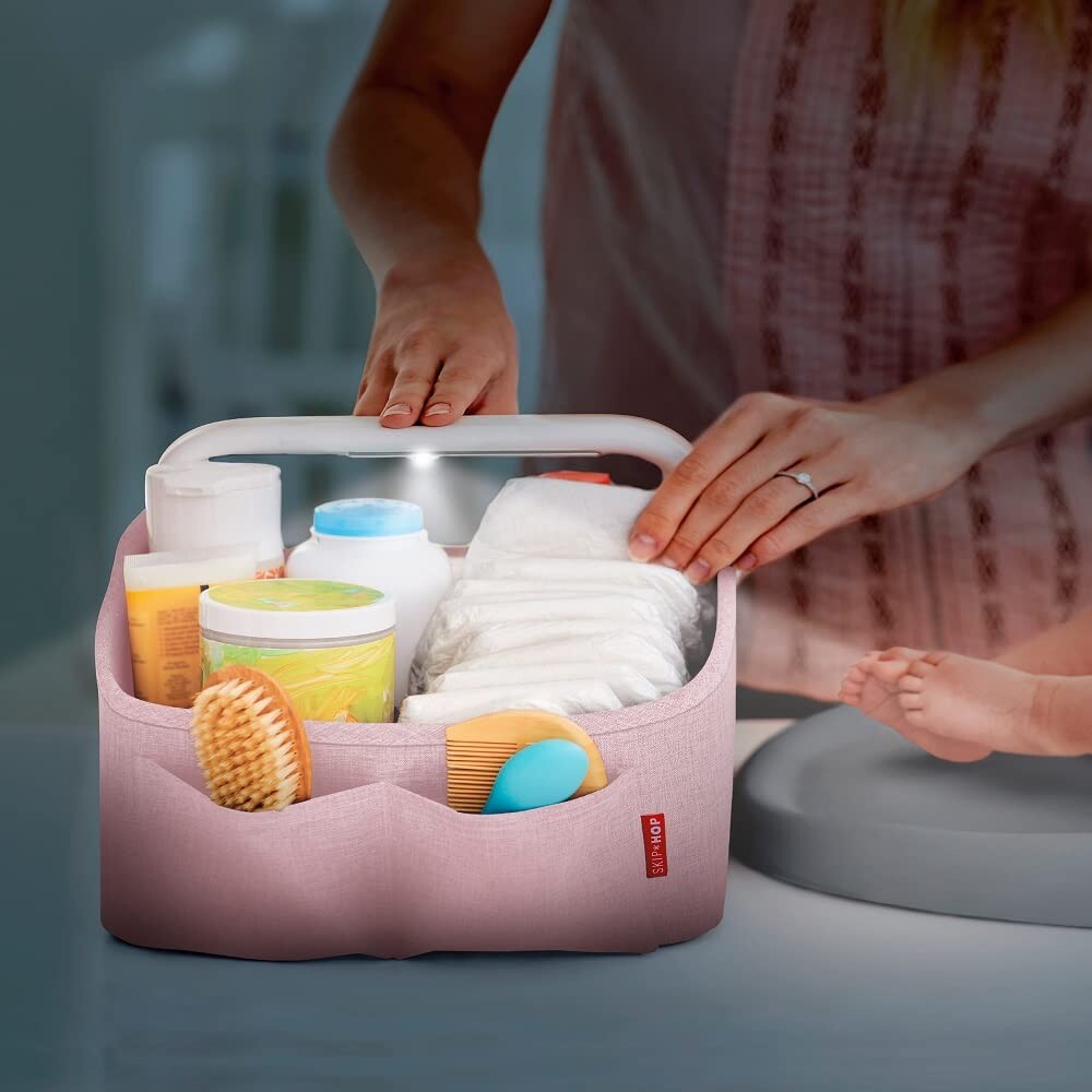 Organizador de pañales con luz skip hop Caddy Rosa