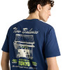 Remera New Balance Grab a Bite Tokyo Hombre MT62D8CENNY Azul