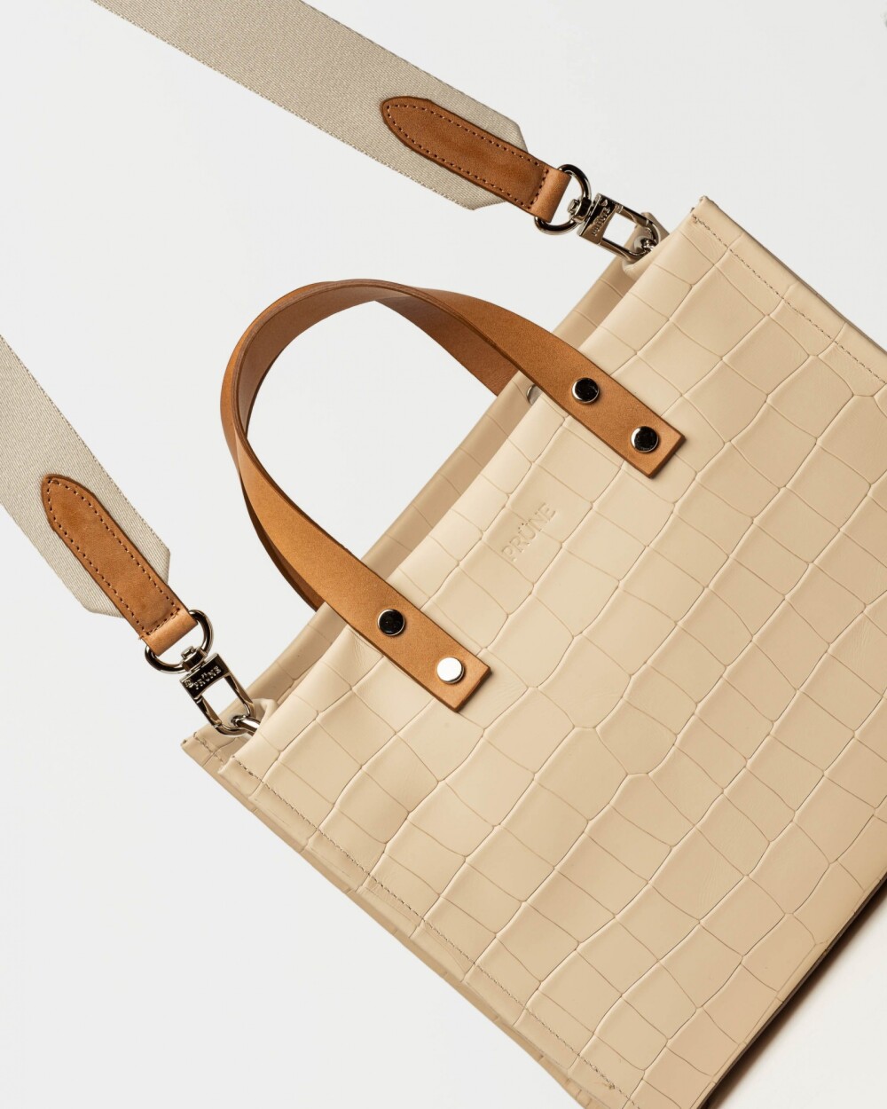 Cartera de mano Capri en cuero grabado croco Natural