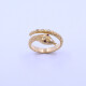 Anillo oro 18k brillantes y rubíes serpiente con punzones. Anillo oro 18k brillantes y rubíes serpiente con punzones.