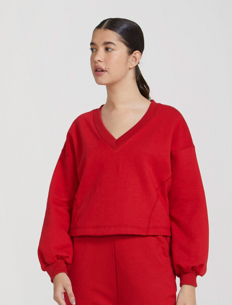 BUZO FEMENINO CON FELPA Y CUELLO EN V ROJO