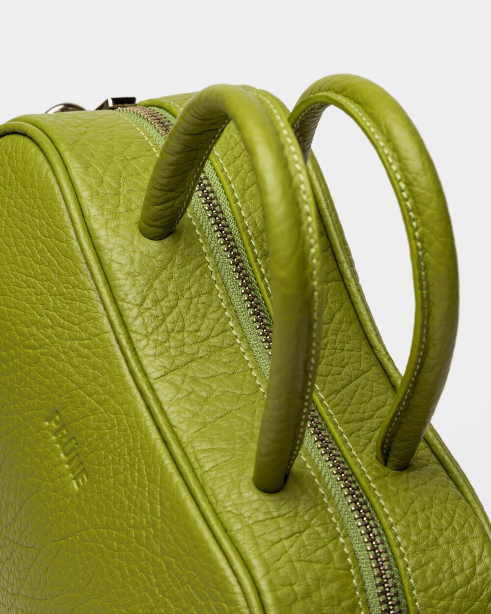 Cartera de mano The Club en cuero graneado Moss