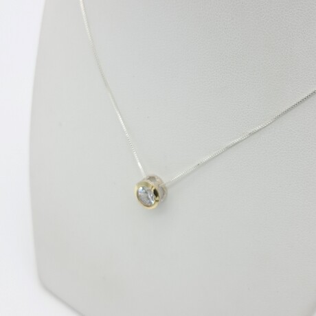 Conjunto de plata 925 con punto de luz en double de oro 18 ktes. Conjunto de plata 925 con punto de luz en double de oro 18 ktes.