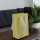 Bolsa cartulina laminada 10x05x15 cm AMARILLO