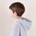 Poncho de toalla celeste con rayas 1 a 3 años