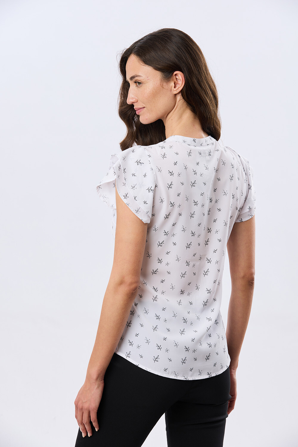 BLUSA CON VOLADOS Hojas Negra