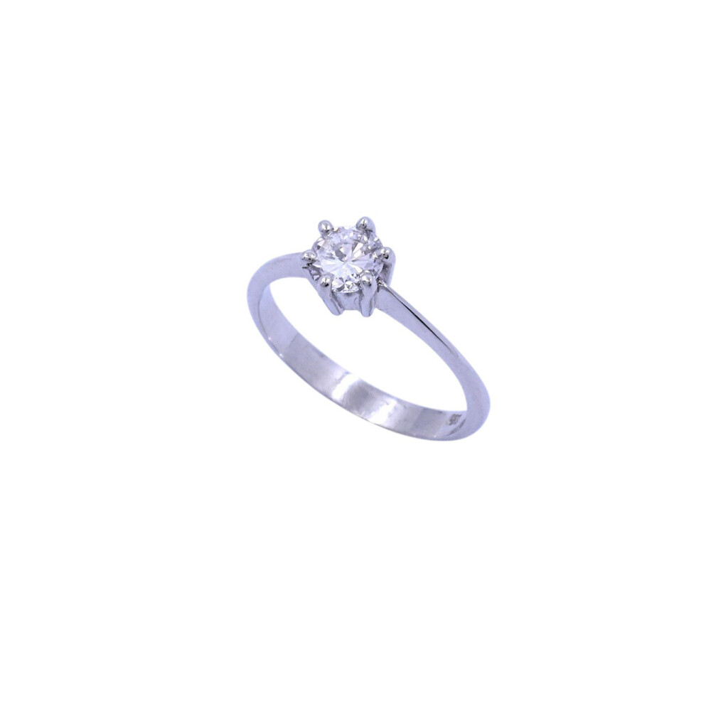 Anillo solitario oro 18k blanco con brillante engrace 6 puntas. Anillo solitario oro 18k blanco con brillante engrace 6 puntas.