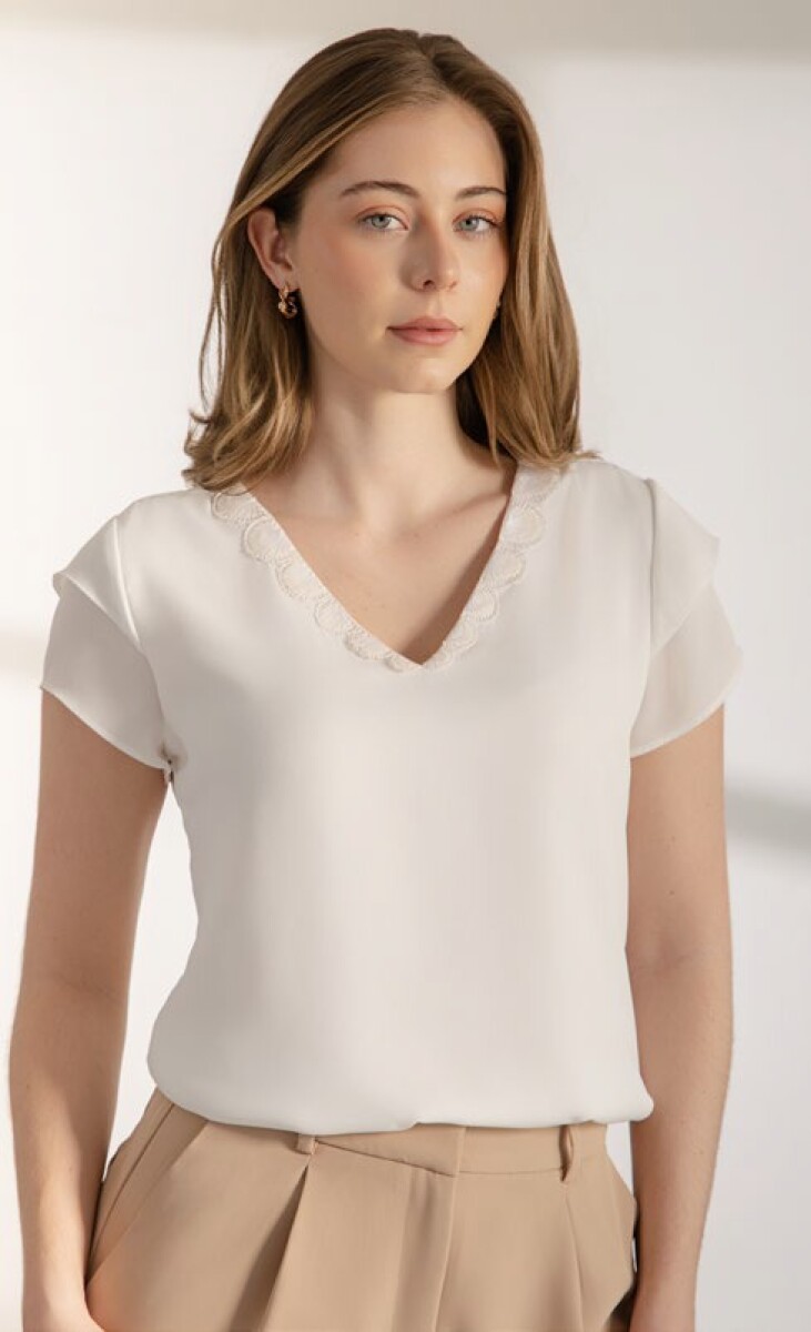 Blusa con mangas. 