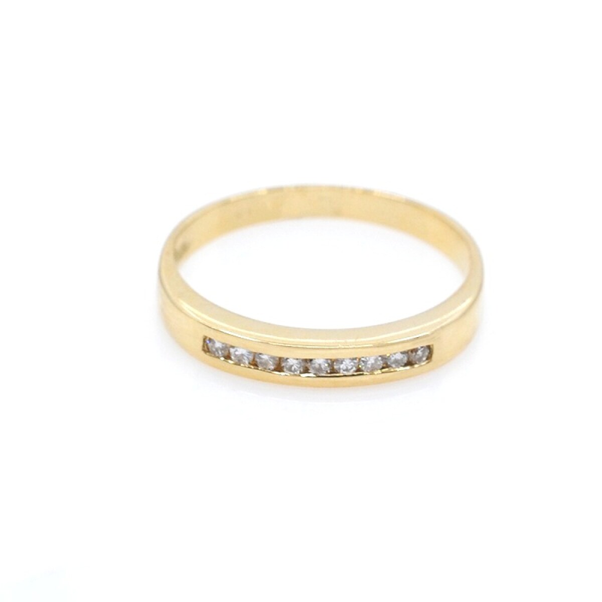 Anillo oro 18k amarillo con 9 brillantes 