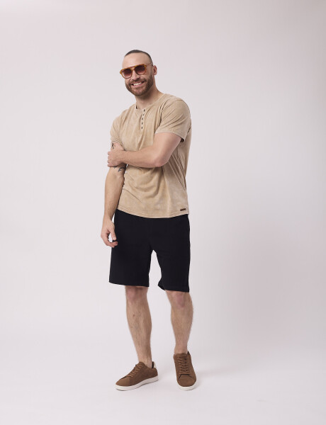 T-shirt estoneada arena