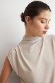 Blusa lurex con tablas beige