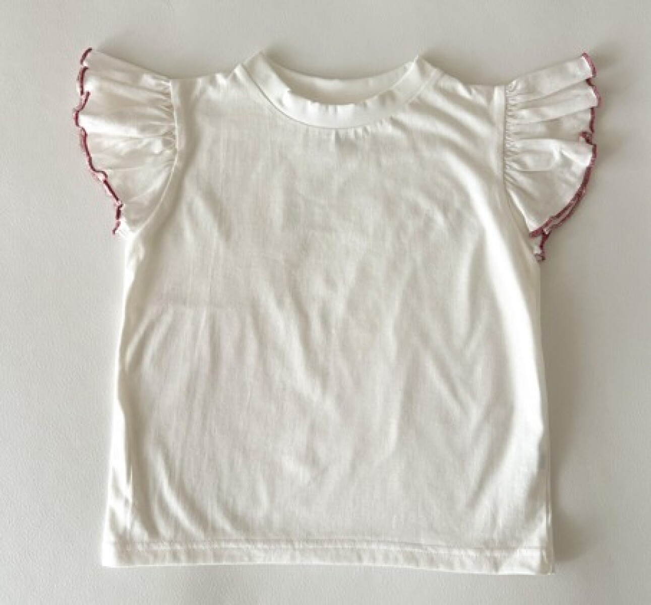 Remera Vuelito rosa viejo 