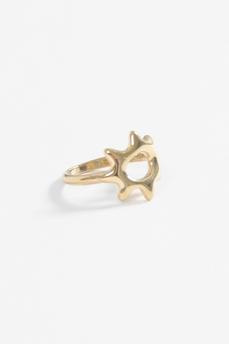Anillo estrella hueco acero dorado