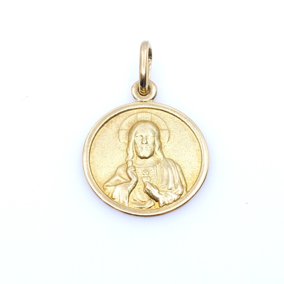 Medalla religiosa en oro 18kts amarillo 