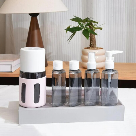 Set de 4 frasquitos con estuche rÃ­gido para viaje Rosado