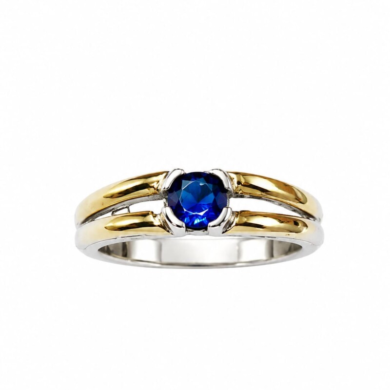Anillo con zirconia azul al centro Anillo con zirconia azul al centro