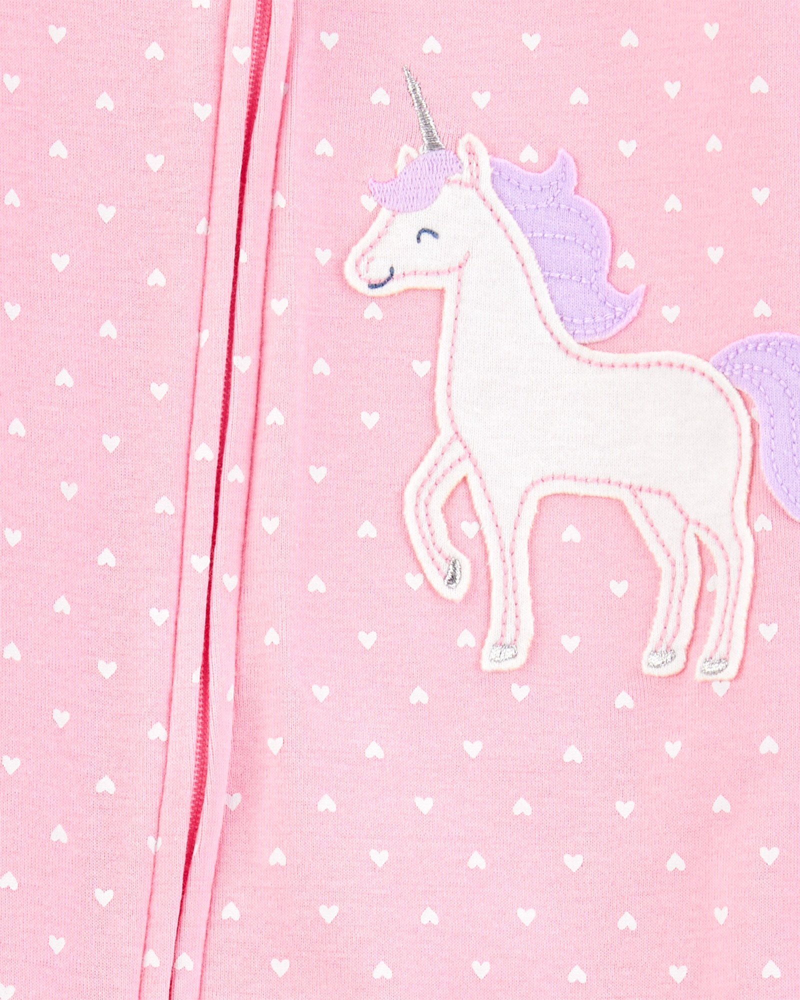 Pijama una pieza de algodón, con pie, rosado, estampa unicornio. Talles 2-5T Pijama una pieza de algodón, con pie, rosado, estampa unicornio. Talles 2-5T