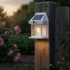 Farol blanco para exterior LED BK888 con carga solar Farol blanco para exterior LED BK888 con carga solar