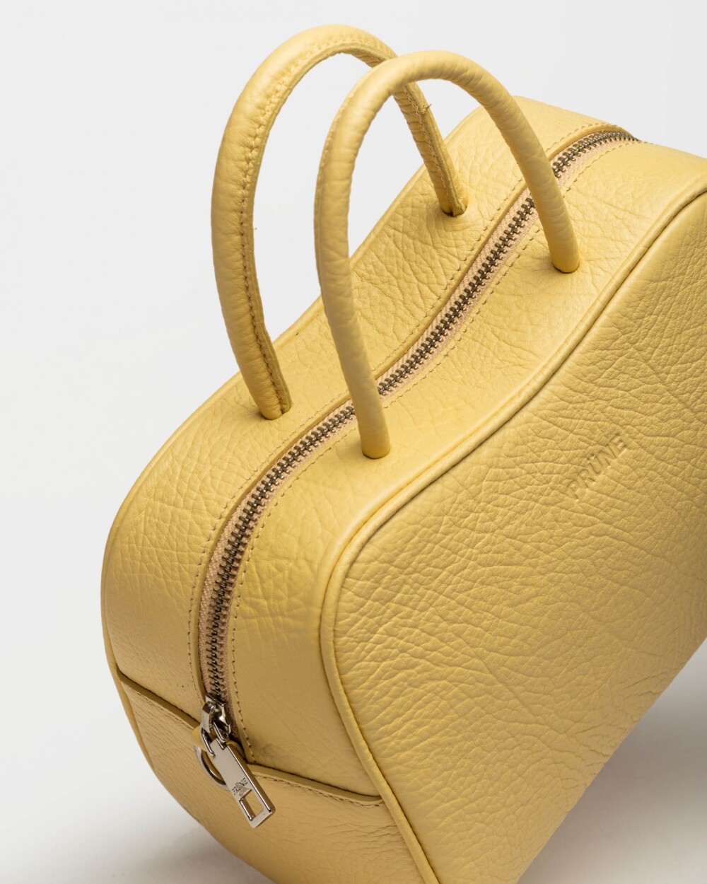 Cartera de mano The Club en cuero graneado Vainilla Niquel