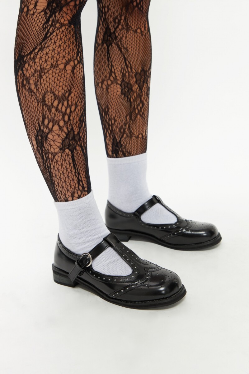 Mocasín tachas negro