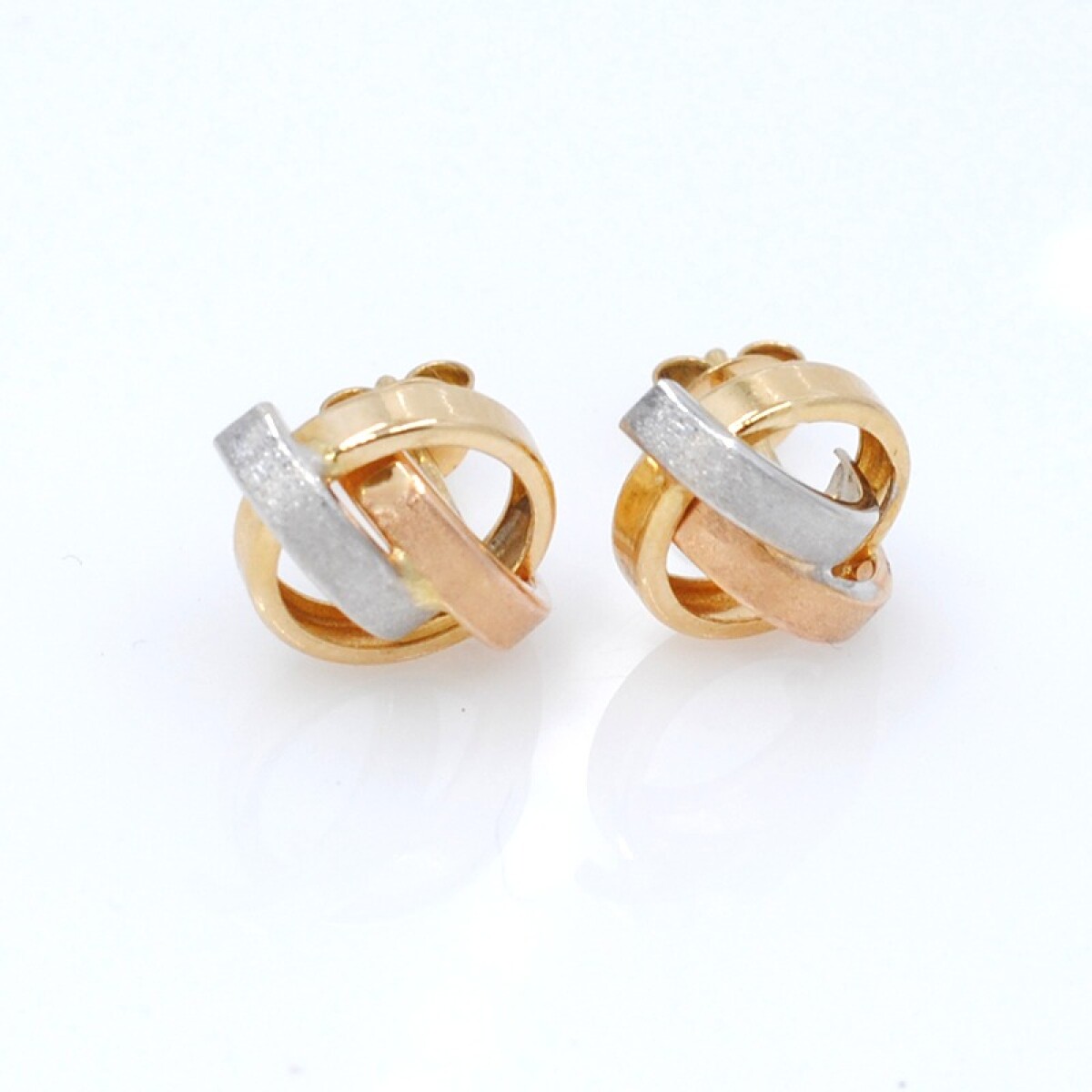 Caravanas en 3 tonos de oro 18k 