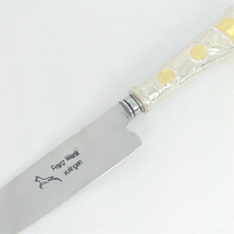 Puñal de plata 925 con apliques en oro 18ktes. Puñal de plata 925 con apliques en oro 18ktes.