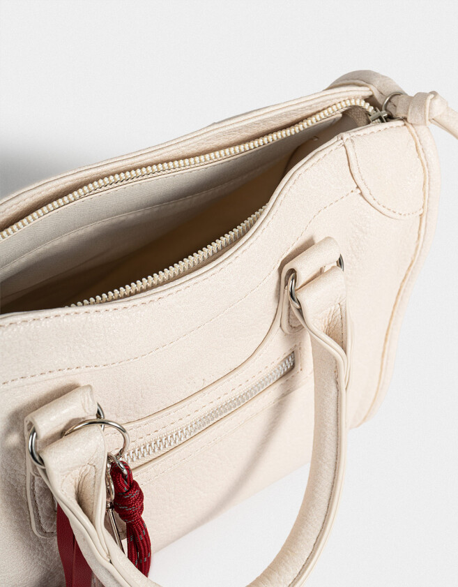 City Cartera City Con Charm - Blanco Crudo