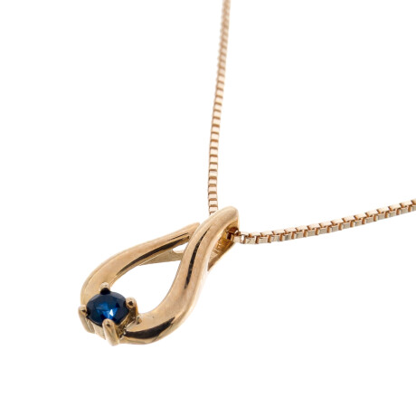 Conjunto de colgante y cadena de oro 9 ktes con zafiro azul. Conjunto de colgante y cadena de oro 9 ktes con zafiro azul.