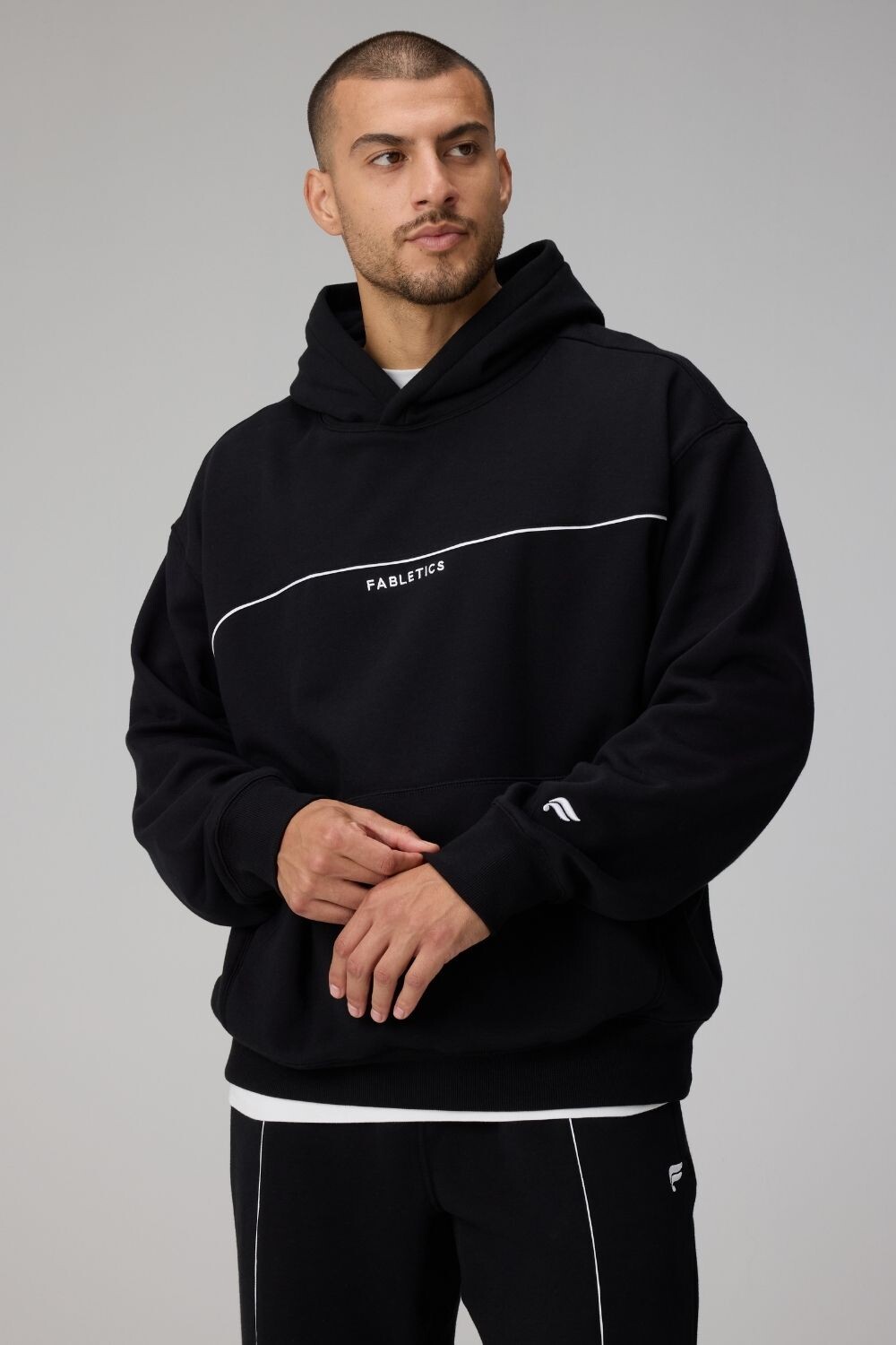 Polera The Go-To Oversized Hoodie Brand Dna Hombre Black/Classic White Dna Stri