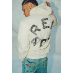 Hoodie Religión Crema