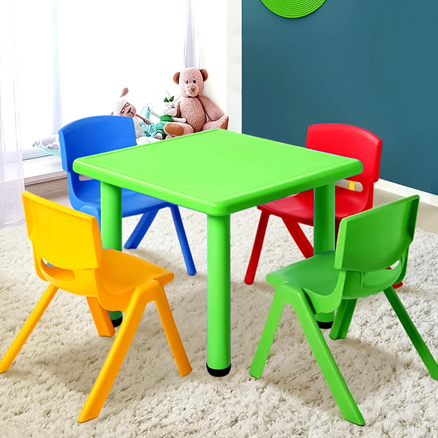 Taburete infantil de plástico color verde y patas multicolor de